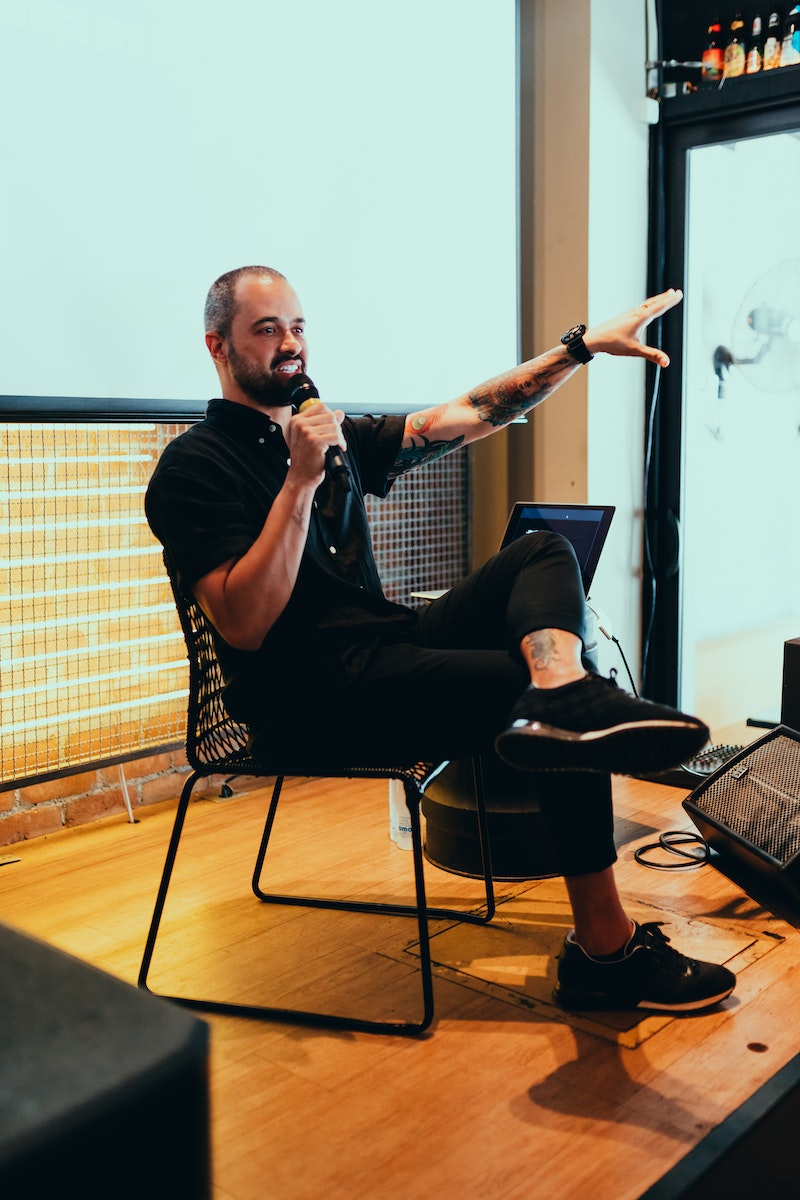 Photo Of Man Holding Mic